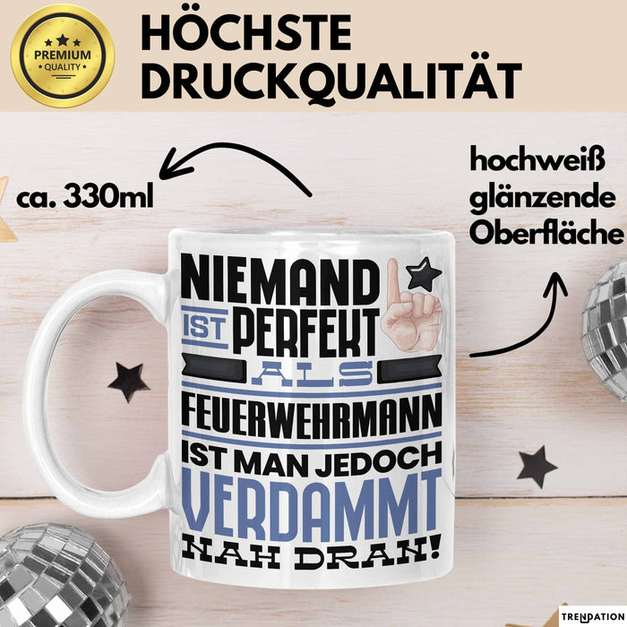 Feuerwehrmann Geschenk Tasse Lustige Geschenkidee für Feuerwehrmann Geburtstag Kaffee-Becher Niemand Ist Perfekt Aber Als Feuerwehrmann Ist Man Nah Dran Weiß Trendation