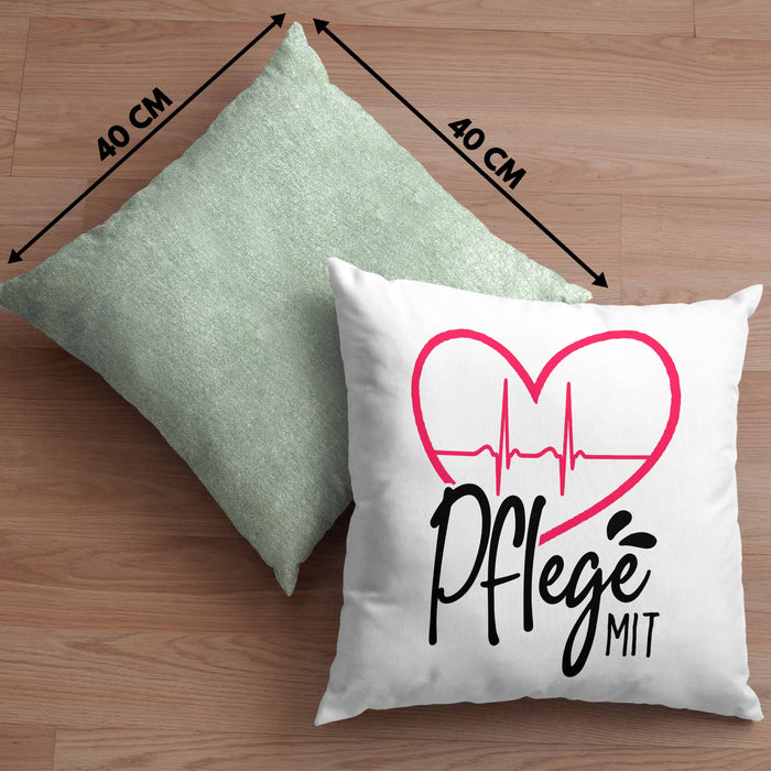 Geschenkidee Pfleger Kissen mit Füllung 40x40 "Pflege mit Herz" Grafik Pfleger Geschenk (Grau) Grün Trendation