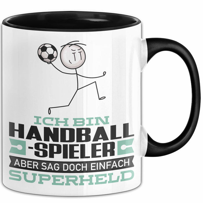 Handballspieler Geschenk Tasse Ich Bin Handballspieler Aber Sag Doch Einfach Superheld Lustige Geschenkdiee für Handballspieler Kaffee-Becher Schwarz Trendation