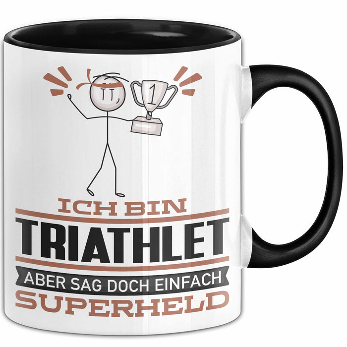 Triathlet Geschenk Tasse Ich Bin Triathlet Aber Sag Doch Einfach Superheld Lustige Geschenkdiee für Triathlet Kaffee-Becher Schwarz Trendation
