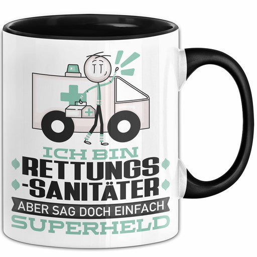 Rettungssanitäter Geschenk Tasse Ich Bin Rettungssanitäter Aber Sag Doch Einfach Superheld Lustige Geschenkdiee für Rettungssanitäter Kaffee-Becher Schwarz Trendation