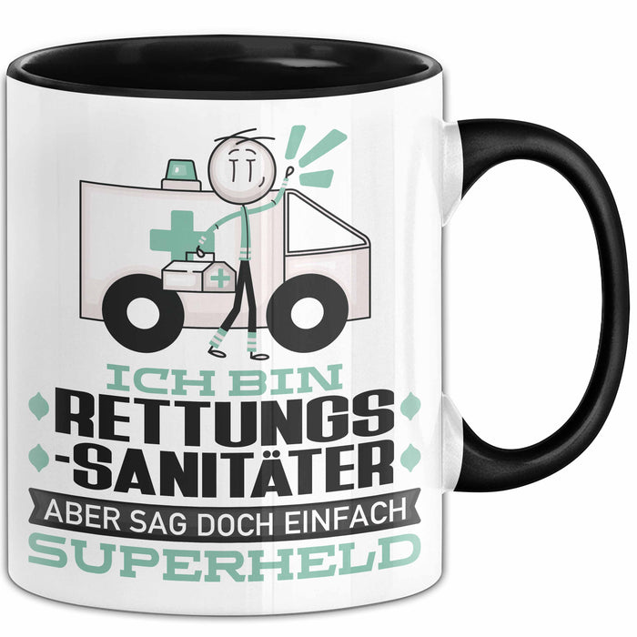 Rettungssanitäter Geschenk Tasse Ich Bin Rettungssanitäter Aber Sag Doch Einfach Superheld Lustige Geschenkdiee für Rettungssanitäter Kaffee-Becher Schwarz Trendation