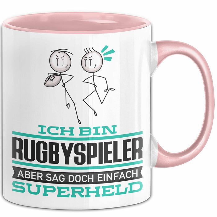 Rugbyspieler Geschenk Tasse Ich Bin Rugbyspieler Aber Sag Doch Einfach Superheld Lustige Geschenkdiee für Rugbyspieler Kaffee-Becher Rosa Trendation