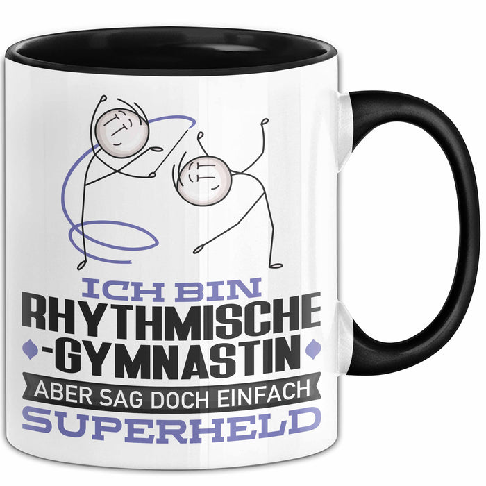 RhythmischeGymnastin Geschenk Tasse Ich Bin RhythmischeGymnastin Aber Sag Doch Einfach Superheld Lustige Geschenkdiee für RhythmischeGymnastin Kaffee-Becher Schwarz Trendation
