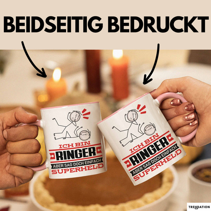 Ringer Geschenk Tasse Ich Bin Ringer Aber Sag Doch Einfach Superheld Lustige Geschenkdiee für Ringer Kaffee-Becher Rosa Trendation