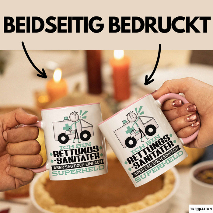 Rettungssanitäter Geschenk Tasse Ich Bin Rettungssanitäter Aber Sag Doch Einfach Superheld Lustige Geschenkdiee für Rettungssanitäter Kaffee-Becher Rosa Trendation
