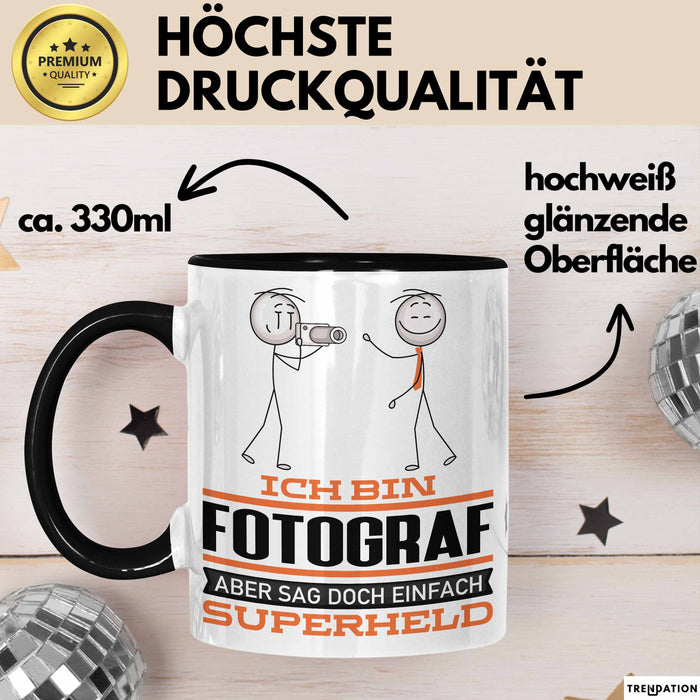 Fotograf Geschenk Tasse Ich Bin Fotograf Aber Sag Doch Einfach Superheld Lustige Geschenkdiee für Fotograf Kaffee-Becher Schwarz Trendation