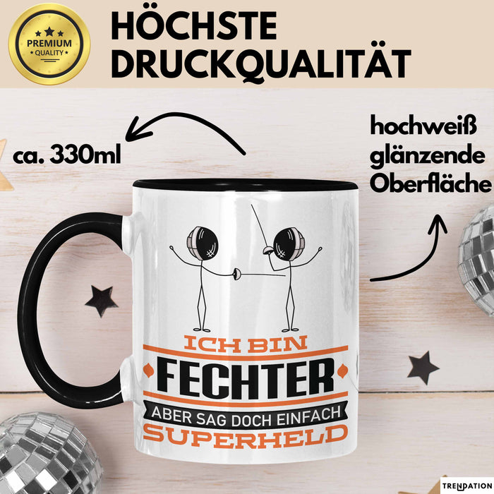 Fechter Geschenk Tasse Ich Bin Fechter Aber Sag Doch Einfach Superheld Lustige Geschenkdiee für Fechter Kaffee-Becher Schwarz Trendation