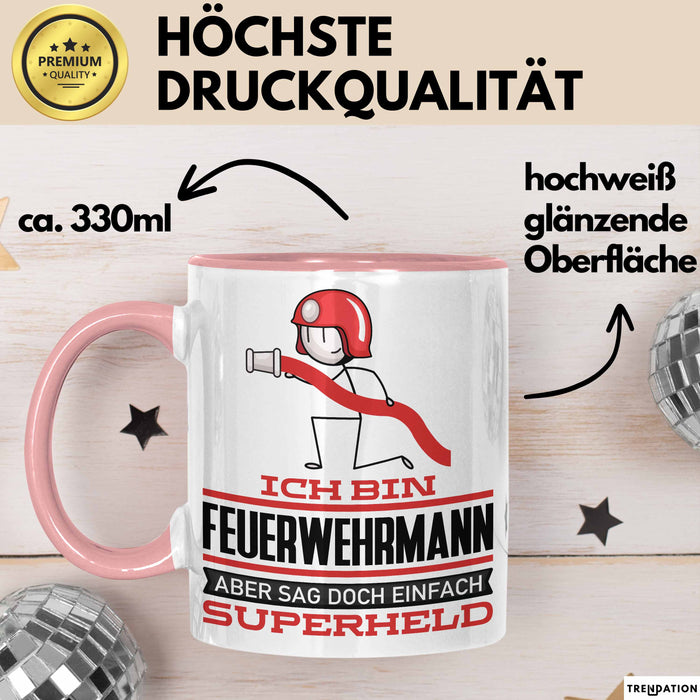 Feuerwehrmann Geschenk Tasse Ich Bin Feuerwehrmann Aber Sag Doch Einfach Superheld Lustige Geschenkdiee für Feuerwehrmann Kaffee-Becher Rosa Trendation