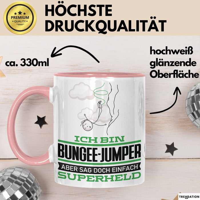 Bungee-Jumper Geschenk Tasse Ich Bin Bungee-Jumper Aber Sag Doch Einfach Superheld Lustige Geschenkdiee für Bungee-Jumper Kaffee-Becher Rosa Trendation
