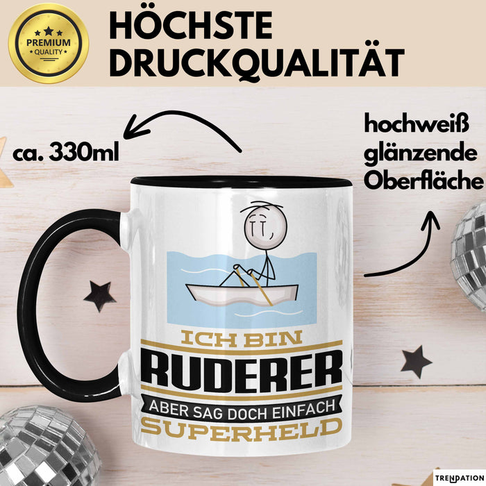 Ruderer Geschenk Tasse Ich Bin Ruderer Aber Sag Doch Einfach Superheld Lustige Geschenkdiee für Ruderer Kaffee-Becher Schwarz Trendation