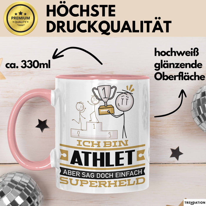 Athlet Geschenk Tasse Ich Bin Athlet Aber Sag Doch Einfach Superheld Lustige Geschenkdiee für Athlet Kaffee-Becher Rosa Trendation