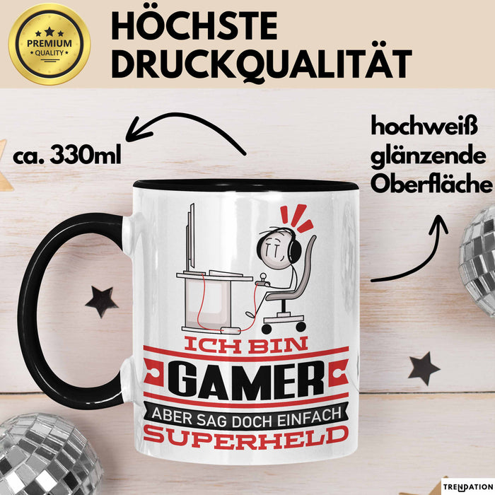 Gamer Geschenk Tasse Ich Bin Gamer Aber Sag Doch Einfach Superheld Lustige Geschenkdiee für Gamer Kaffee-Becher Schwarz Trendation