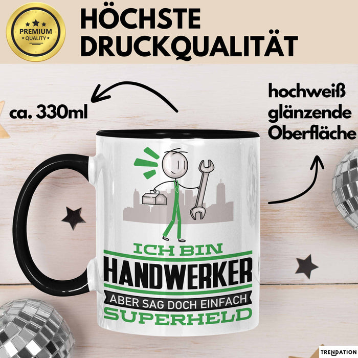 Handwerker Geschenk Tasse Ich Bin Handwerker Aber Sag Doch Einfach Superheld Lustige Geschenkdiee für Handwerker Kaffee-Becher Schwarz Trendation