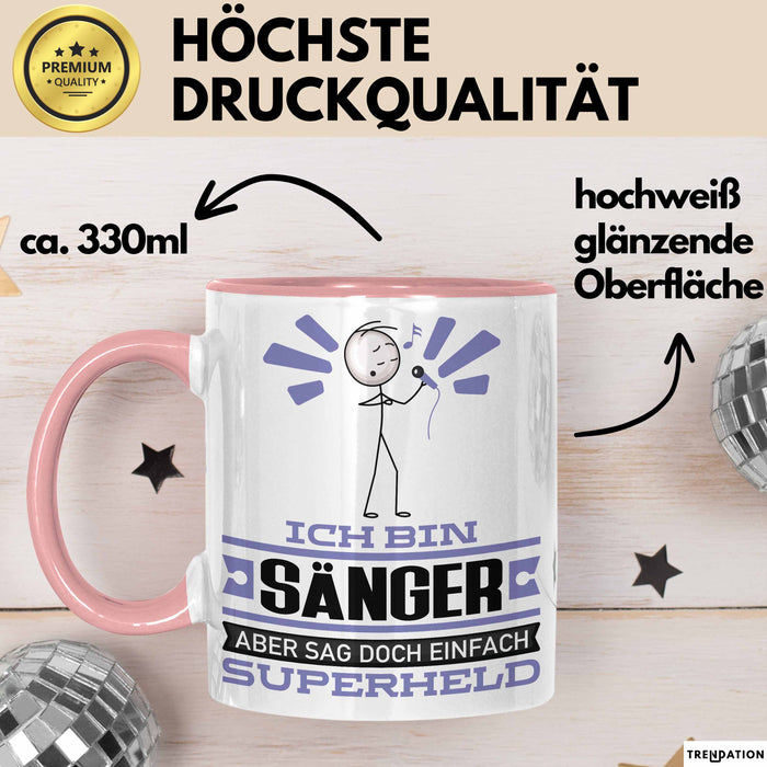Sänger Geschenk Tasse Ich Bin Sänger Aber Sag Doch Einfach Superheld Lustige Geschenkdiee für Sänger Kaffee-Becher Rosa Trendation