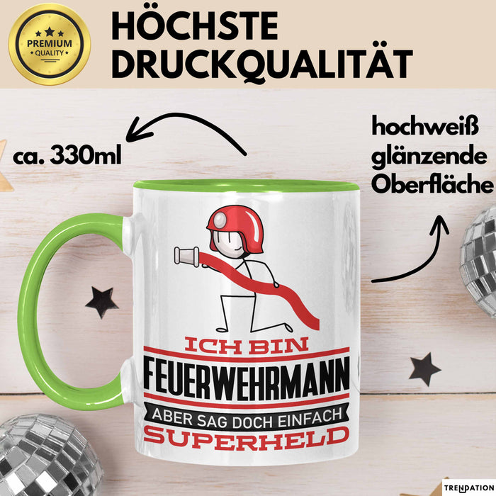 Feuerwehrmann Geschenk Tasse Ich Bin Feuerwehrmann Aber Sag Doch Einfach Superheld Lustige Geschenkdiee für Feuerwehrmann Kaffee-Becher Grün Trendation