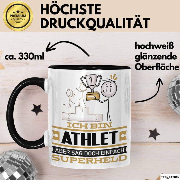 Athlet Geschenk Tasse Ich Bin Athlet Aber Sag Doch Einfach Superheld Lustige Geschenkdiee für Athlet Kaffee-Becher Schwarz Trendation