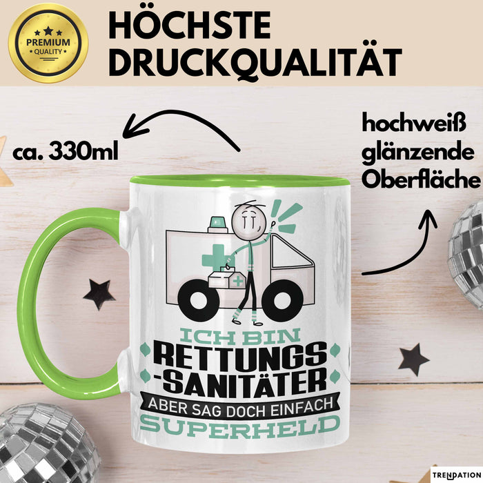 Rettungssanitäter Geschenk Tasse Ich Bin Rettungssanitäter Aber Sag Doch Einfach Superheld Lustige Geschenkdiee für Rettungssanitäter Kaffee-Becher Grün Trendation