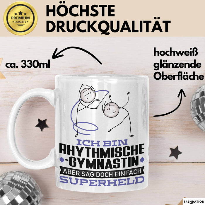 RhythmischeGymnastin Geschenk Tasse Ich Bin RhythmischeGymnastin Aber Sag Doch Einfach Superheld Lustige Geschenkdiee für RhythmischeGymnastin Kaffee-Becher Weiß Trendation