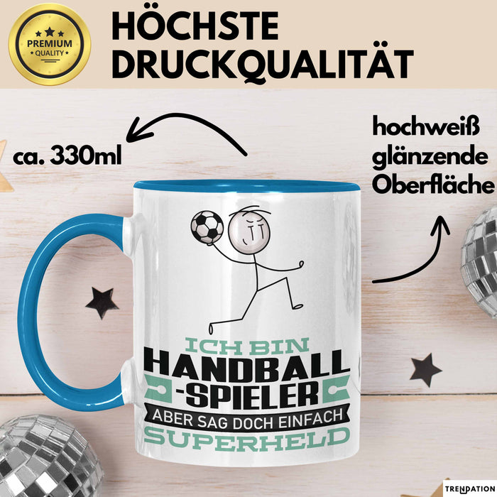 Handballspieler Geschenk Tasse Ich Bin Handballspieler Aber Sag Doch Einfach Superheld Lustige Geschenkdiee für Handballspieler Kaffee-Becher Blau Trendation