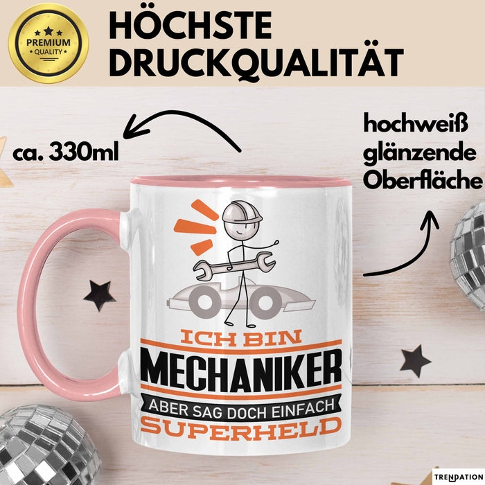 Mechaniker Geschenk Tasse Ich Bin Mechaniker Aber Sag Doch Einfach Superheld Lustige Geschenkdiee für Mechaniker Kaffee-Becher Rosa Trendation