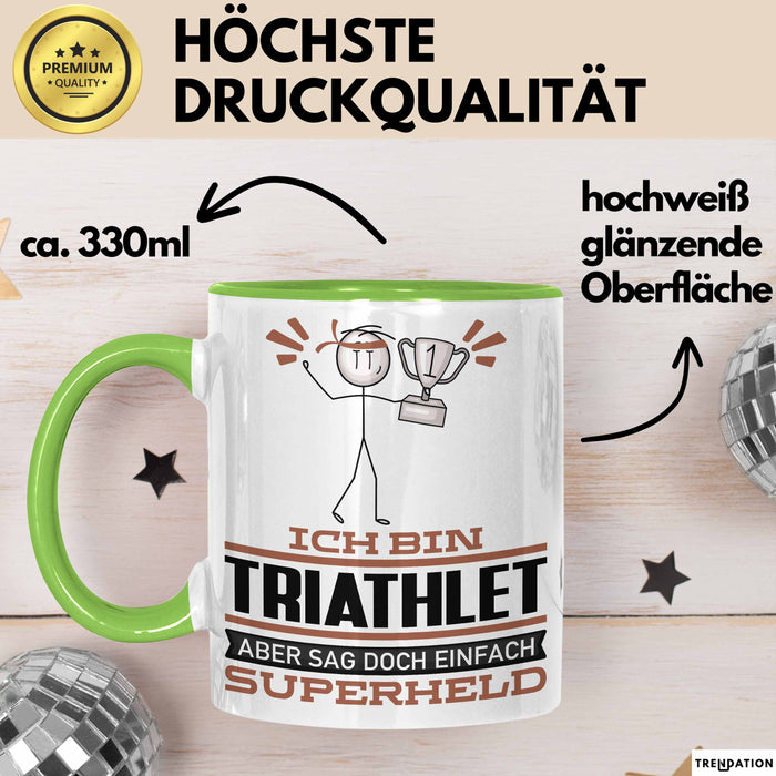 Triathlet Geschenk Tasse Ich Bin Triathlet Aber Sag Doch Einfach Superheld Lustige Geschenkdiee für Triathlet Kaffee-Becher Grün Trendation
