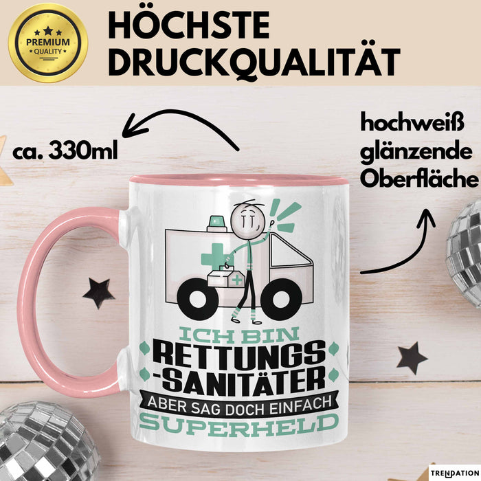 Rettungssanitäter Geschenk Tasse Ich Bin Rettungssanitäter Aber Sag Doch Einfach Superheld Lustige Geschenkdiee für Rettungssanitäter Kaffee-Becher Rosa Trendation