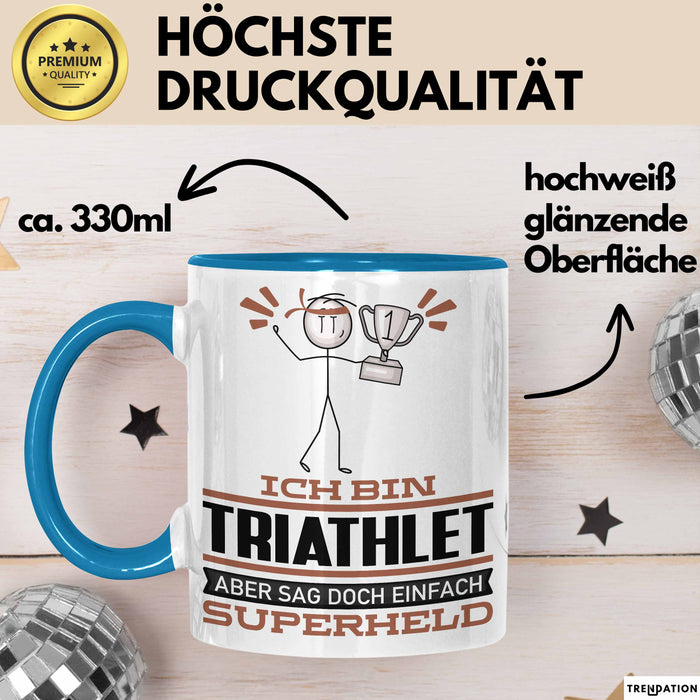 Triathlet Geschenk Tasse Ich Bin Triathlet Aber Sag Doch Einfach Superheld Lustige Geschenkdiee für Triathlet Kaffee-Becher Blau Trendation