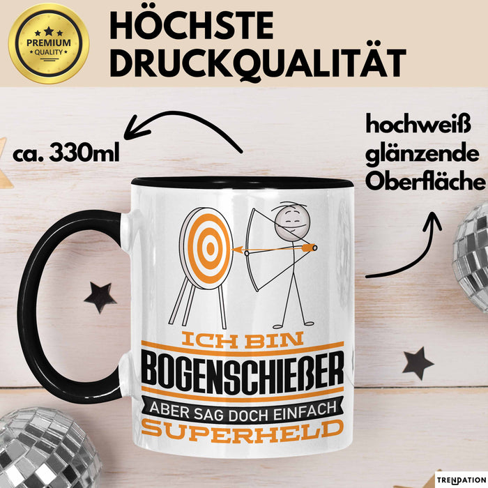Bogenschießer Geschenk Tasse Ich Bin Bogenschießer Aber Sag Doch Einfach Superheld Lustige Geschenkdiee für Bogenschießer Kaffee-Becher Schwarz Trendation