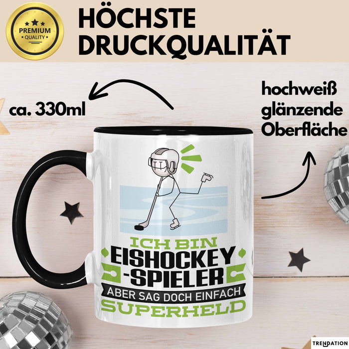 Eishockeyspieler Geschenk Tasse Ich Bin Eishockeyspieler Aber Sag Doch Einfach Superheld Lustige Geschenkdiee für Eishockeyspieler Kaffee-Becher Schwarz Trendation
