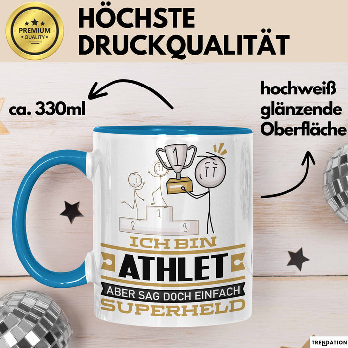 Athlet Geschenk Tasse Ich Bin Athlet Aber Sag Doch Einfach Superheld Lustige Geschenkdiee für Athlet Kaffee-Becher Blau Trendation