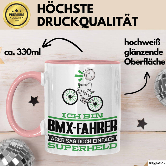 BMX-Fahrer Geschenk Tasse Ich Bin BMX-Fahrer Aber Sag Doch Einfach Superheld Lustige Geschenkdiee für BMX-Fahrer Kaffee-Becher Rosa Trendation