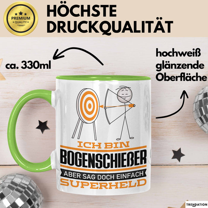 Bogenschießer Geschenk Tasse Ich Bin Bogenschießer Aber Sag Doch Einfach Superheld Lustige Geschenkdiee für Bogenschießer Kaffee-Becher Grün Trendation