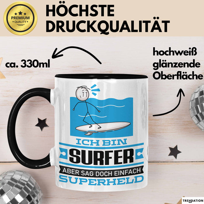 Surfer Geschenk Tasse Ich Bin Surfer Aber Sag Doch Einfach Superheld Lustige Geschenkdiee für Surfer Kaffee-Becher Schwarz Trendation