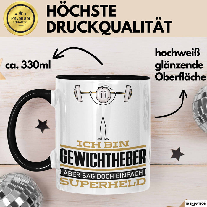 Gewichtheber Geschenk Tasse Ich Bin Gewichtheber Aber Sag Doch Einfach Superheld Lustige Geschenkdiee für Gewichtheber Kaffee-Becher Schwarz Trendation