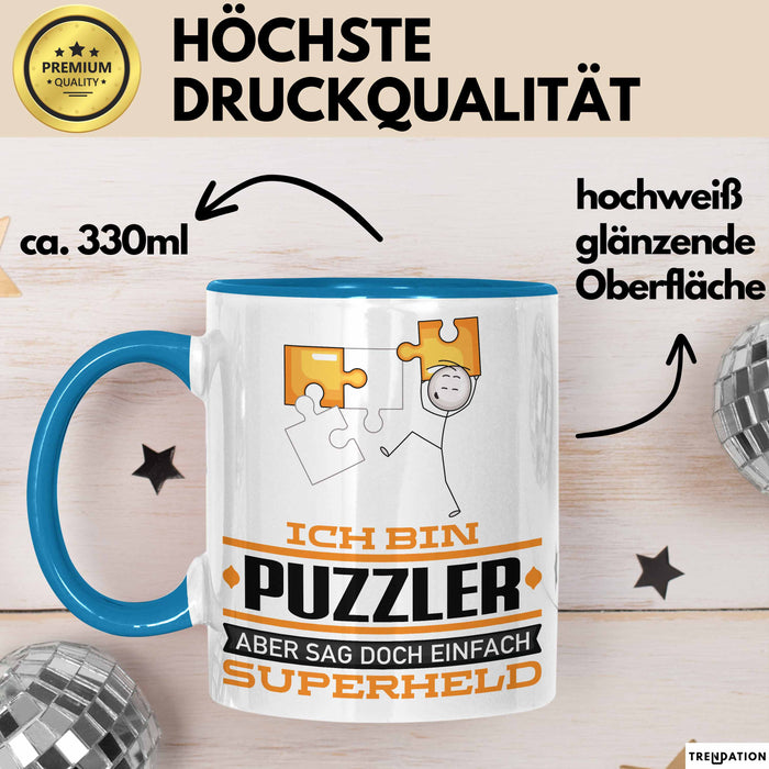 Puzzler Geschenk Tasse Ich Bin Puzzler Aber Sag Doch Einfach Superheld Lustige Geschenkdiee für Puzzler Kaffee-Becher Blau Trendation