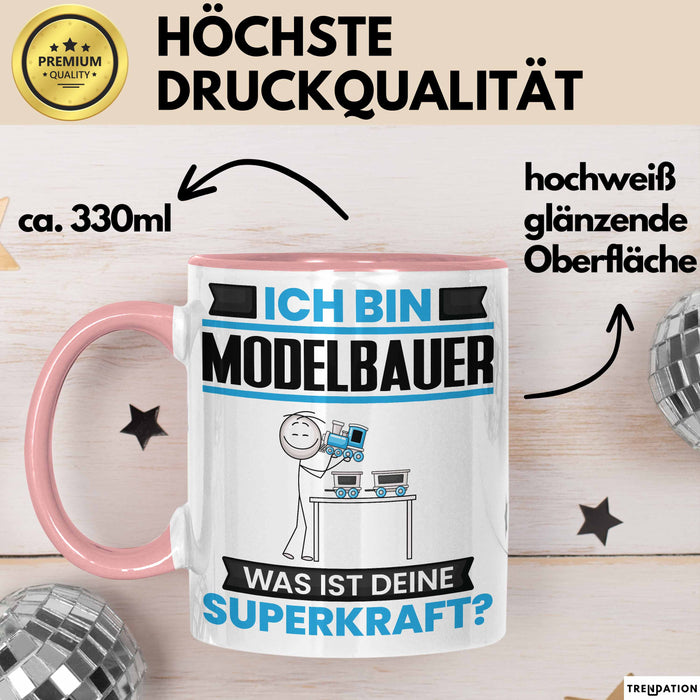 Modelbauer Tasse Geschenk für Modelbauer Geburtstag Lustiger Spruch Kaffee-Becher Was Ist Deine Superkraft Rosa Trendation